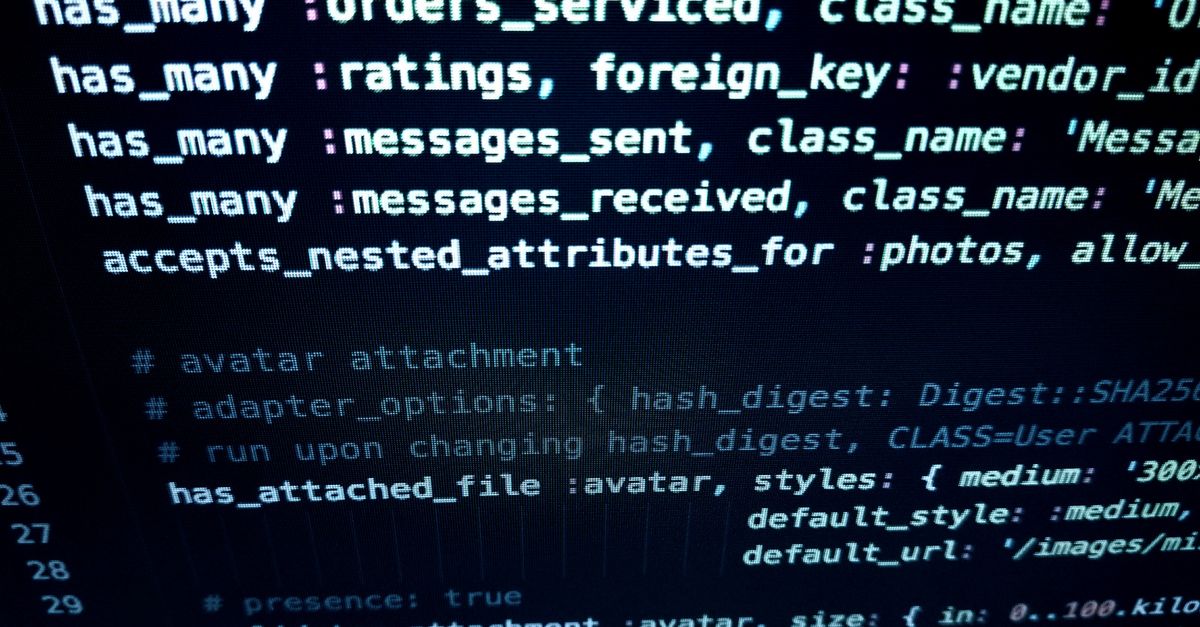 Code displayed on a computer monitor, illustrating web server security headers
